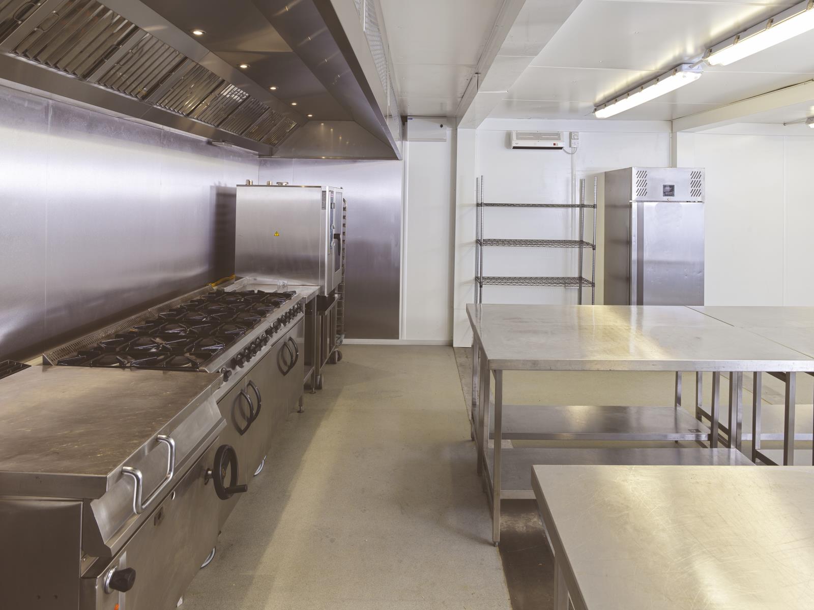 A spacious prep and production temporary commerical kitchen offering significant capacity for covers.